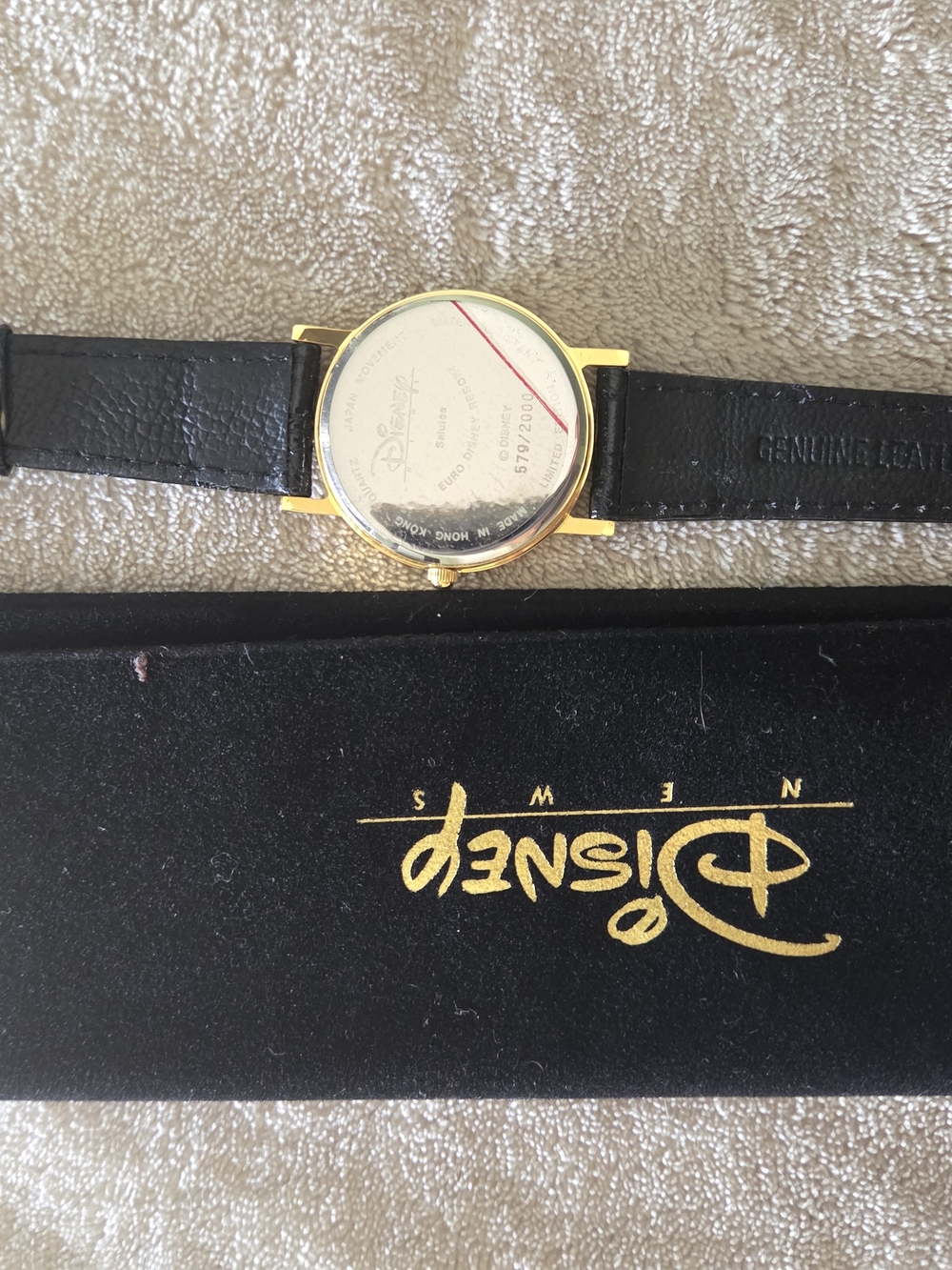 Disney News Gold-Tone Watch with Black Leather Strap